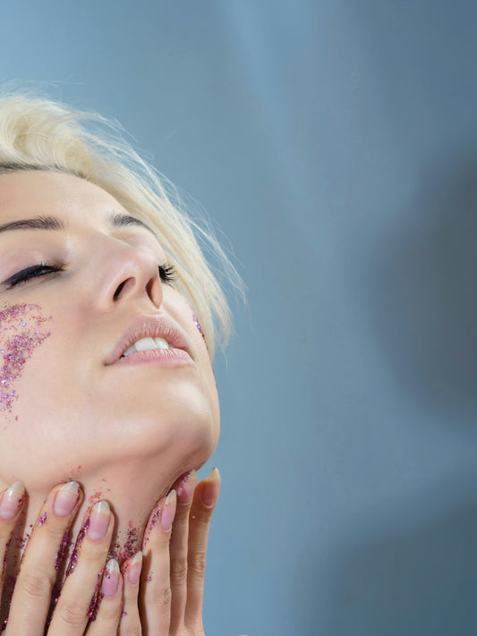 a woman with her hands on her face