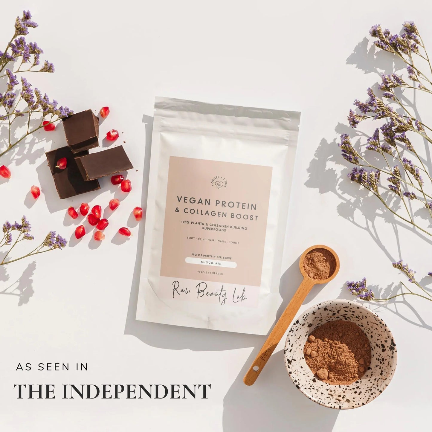 Flatlay of Vegan Protein and Collagen Builder with coffee and flowers – clean plant-based protein for skin and strength