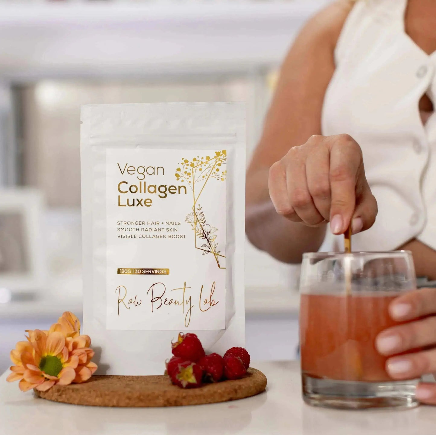 Vegan Collagen Luxe powder drink being mixed in glass – plant-based collagen booster for radiant skin