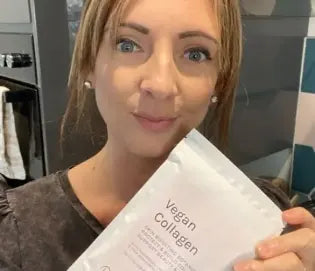 customer holding vegan collagen supplement