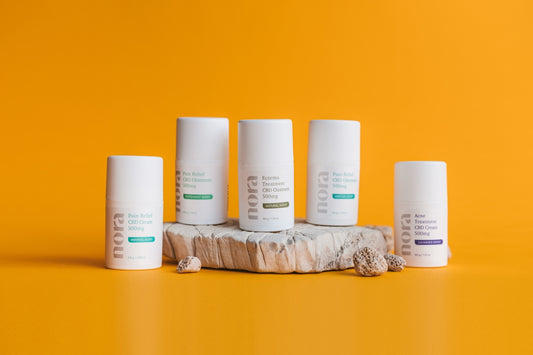 white plastic bottles on brown wooden table