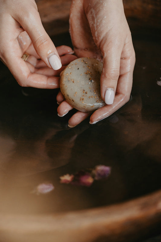 a person holding a potato