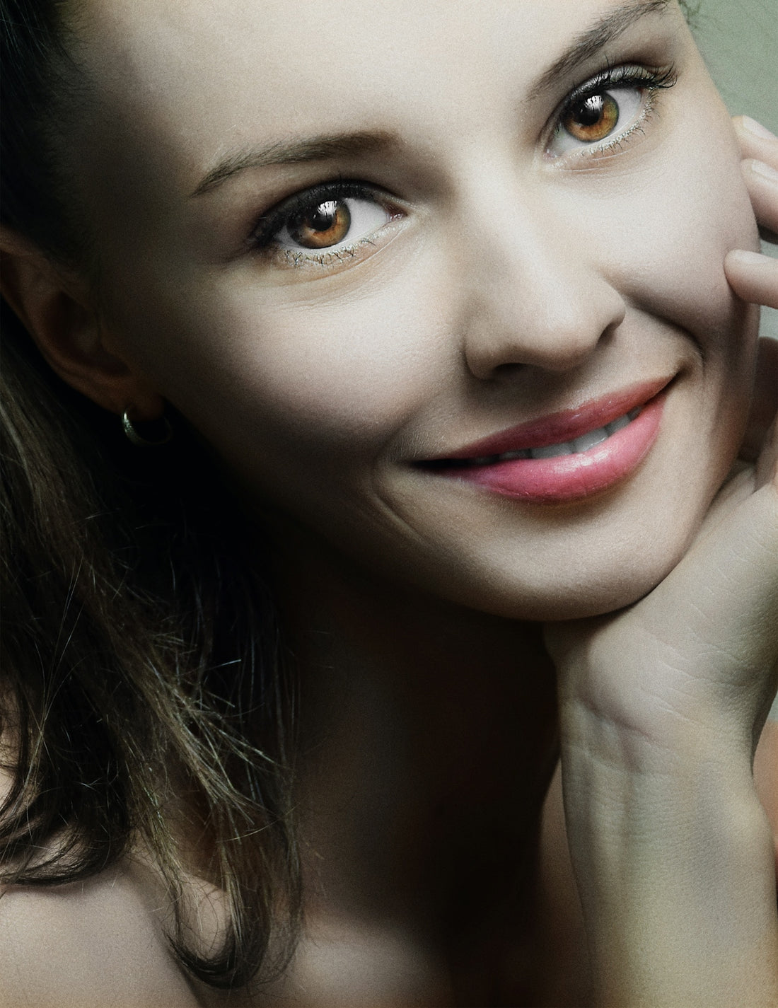 a close up of a person with a smile on their face