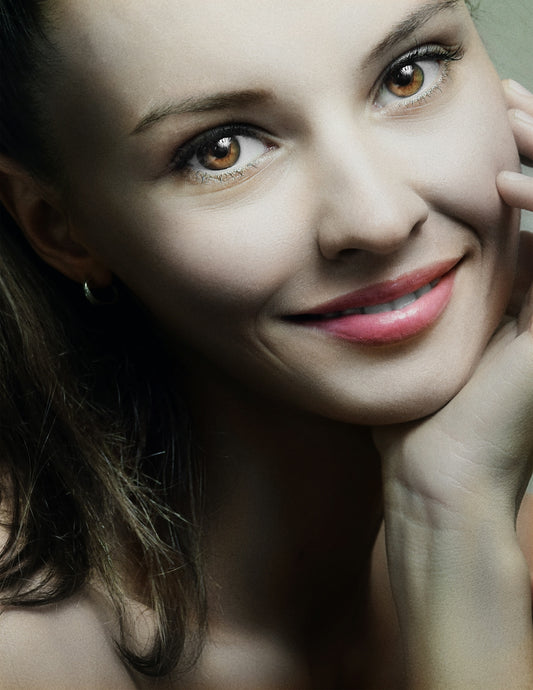 a close up of a person with a smile on their face