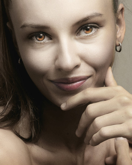 a close up of a person with a smile on her face
