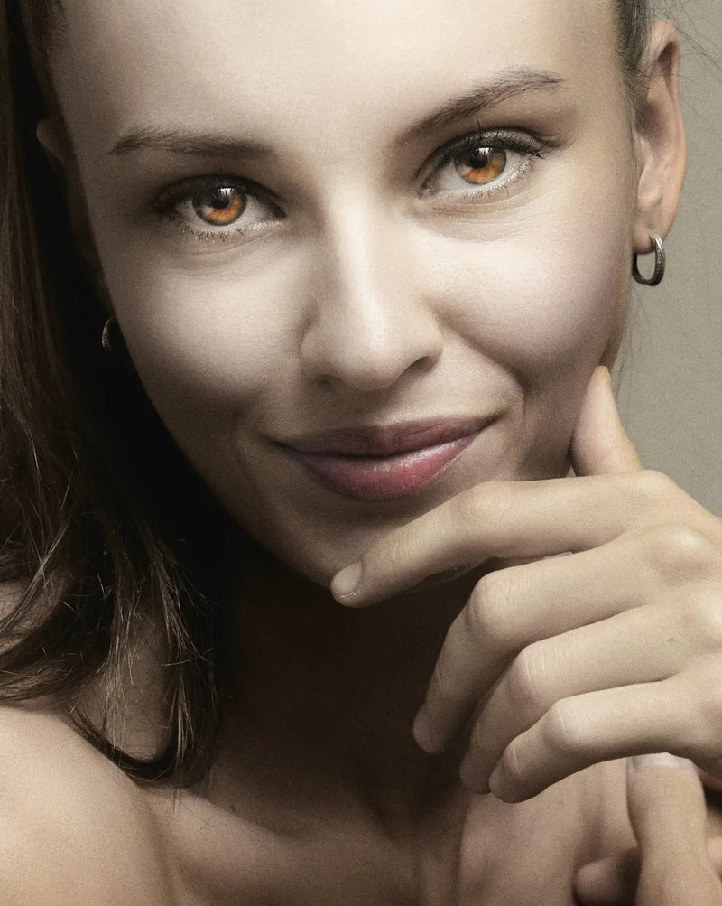 a close up of a person with a smile on her face