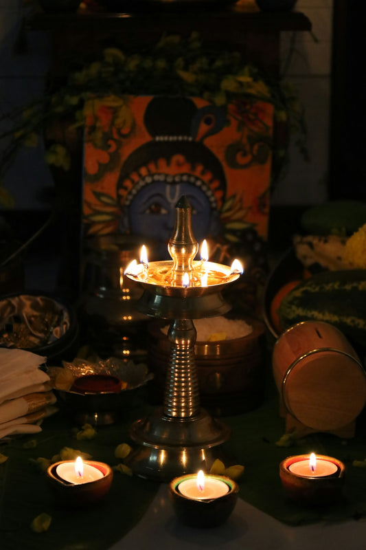 a table topped with lots of lit candles