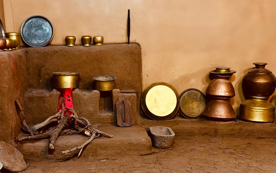 a group of pots sitting on top of a stone floor