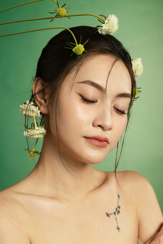 A woman with a flower in her hair