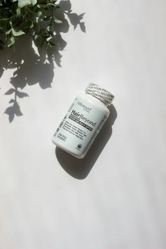 A bottle of hypofoam sitting next to a plant