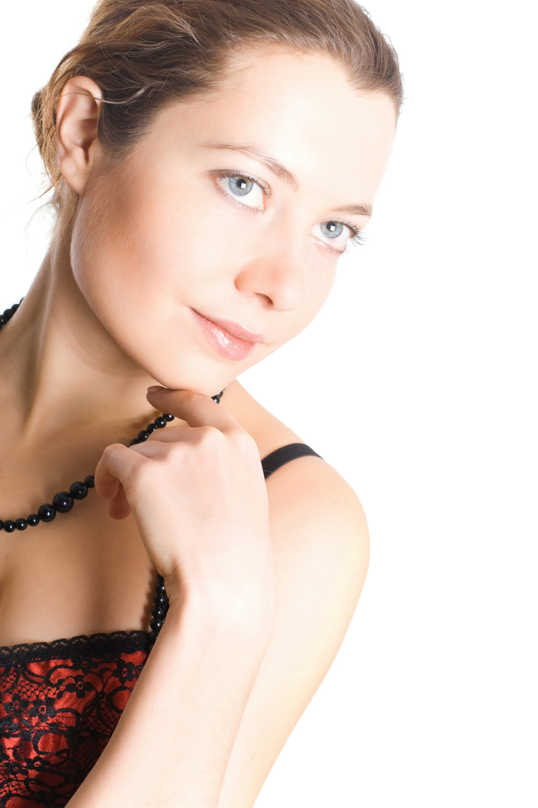 A woman in a bra posing for a picture