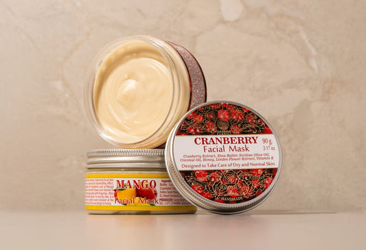 A jar of cream sitting on top of a table