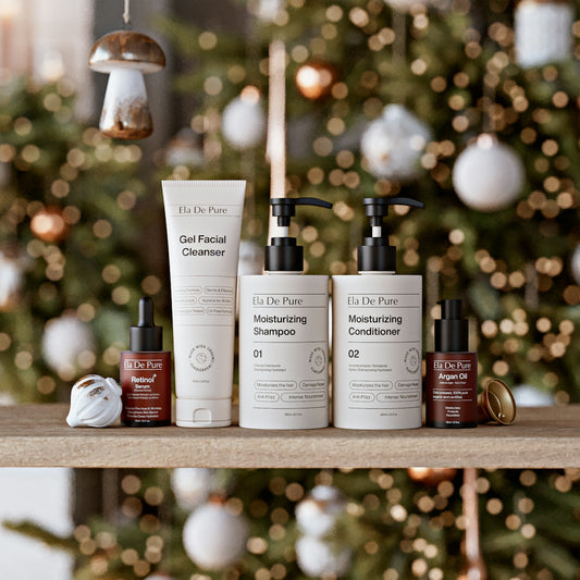Skincare products displayed on a shelf with christmas tree background
