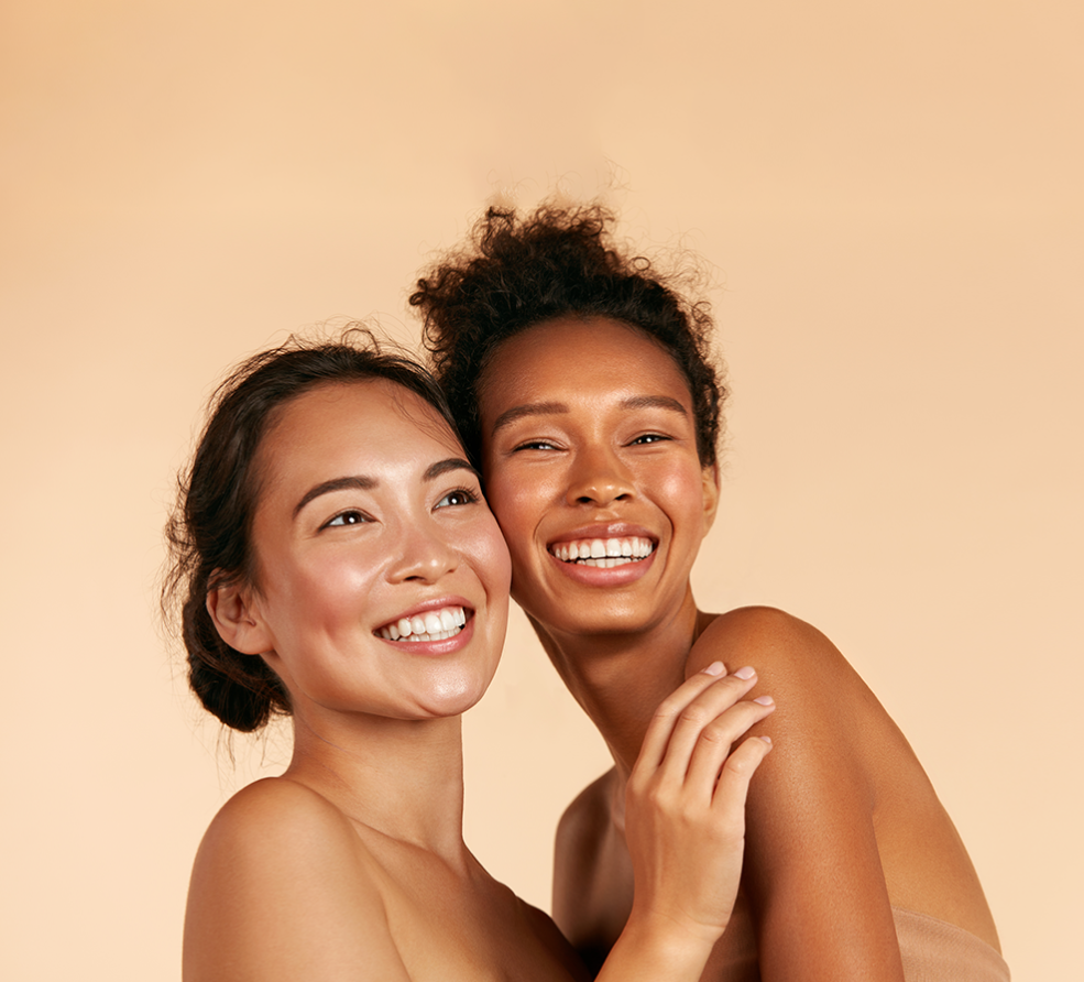 2 women with glowing skin laughing for raw beauty lab discount 1