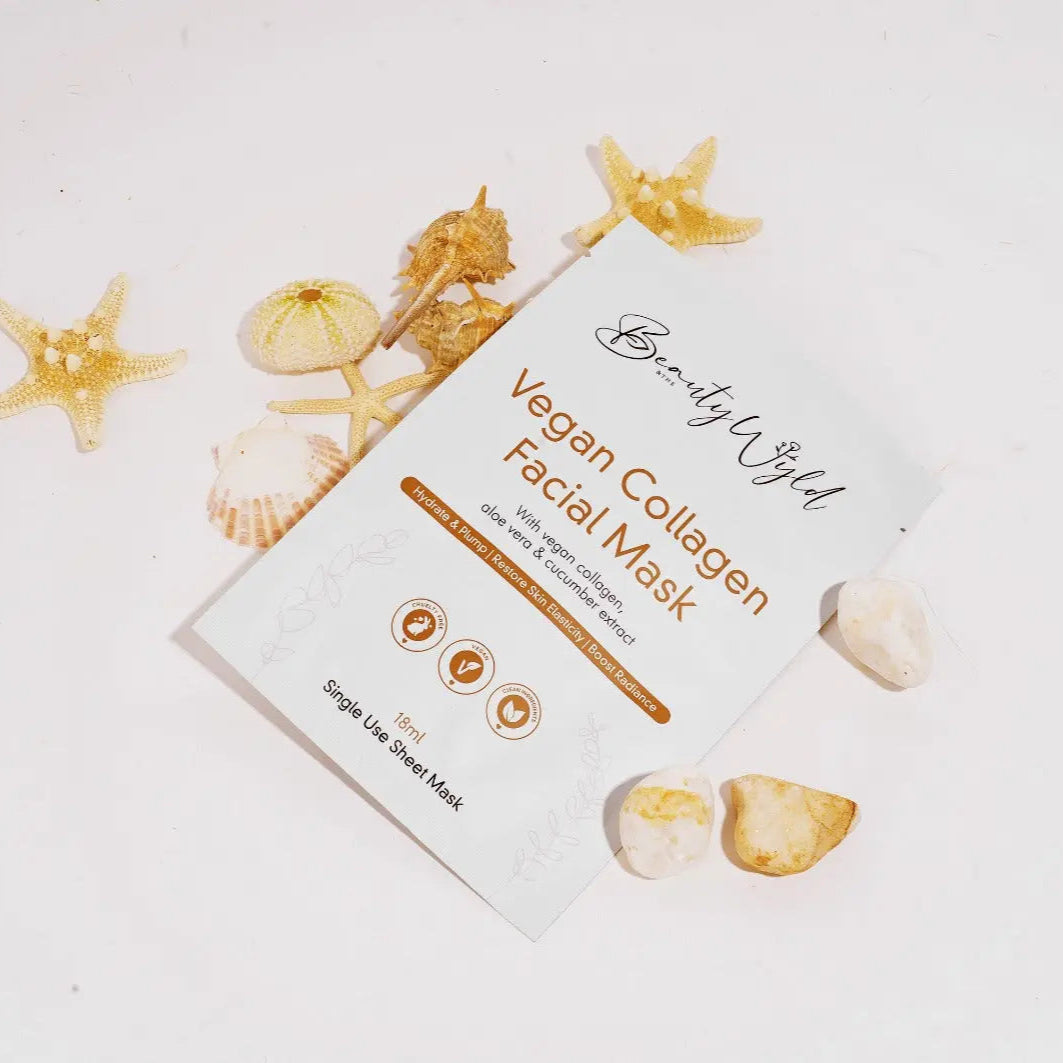 A vegan collagen face mask by Raw Beauty Lab, lying on a white surface with shells surrounding it