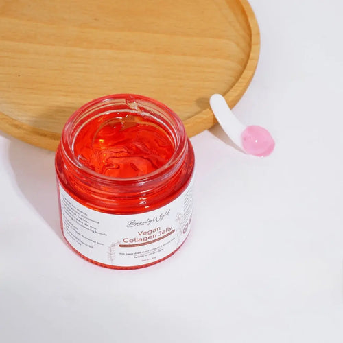 Vegan Collagen Jelly Cream on a white surface with the lid off showing the jelly texture of the contents