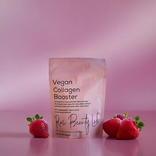 collagen booster package with strawberries on a pink background