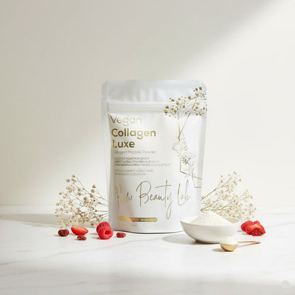 Vegan collagen peptides from Raw Beauty Lab USA surrounded by beautiful botanical ingredients
