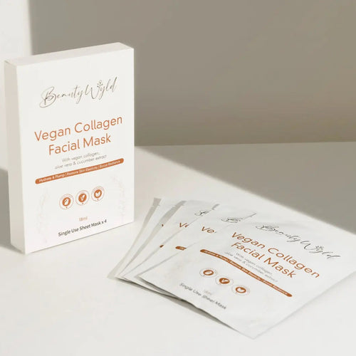 A box and four packets of vegan collagen face masks on a white surface, from Raw Beauty Lab